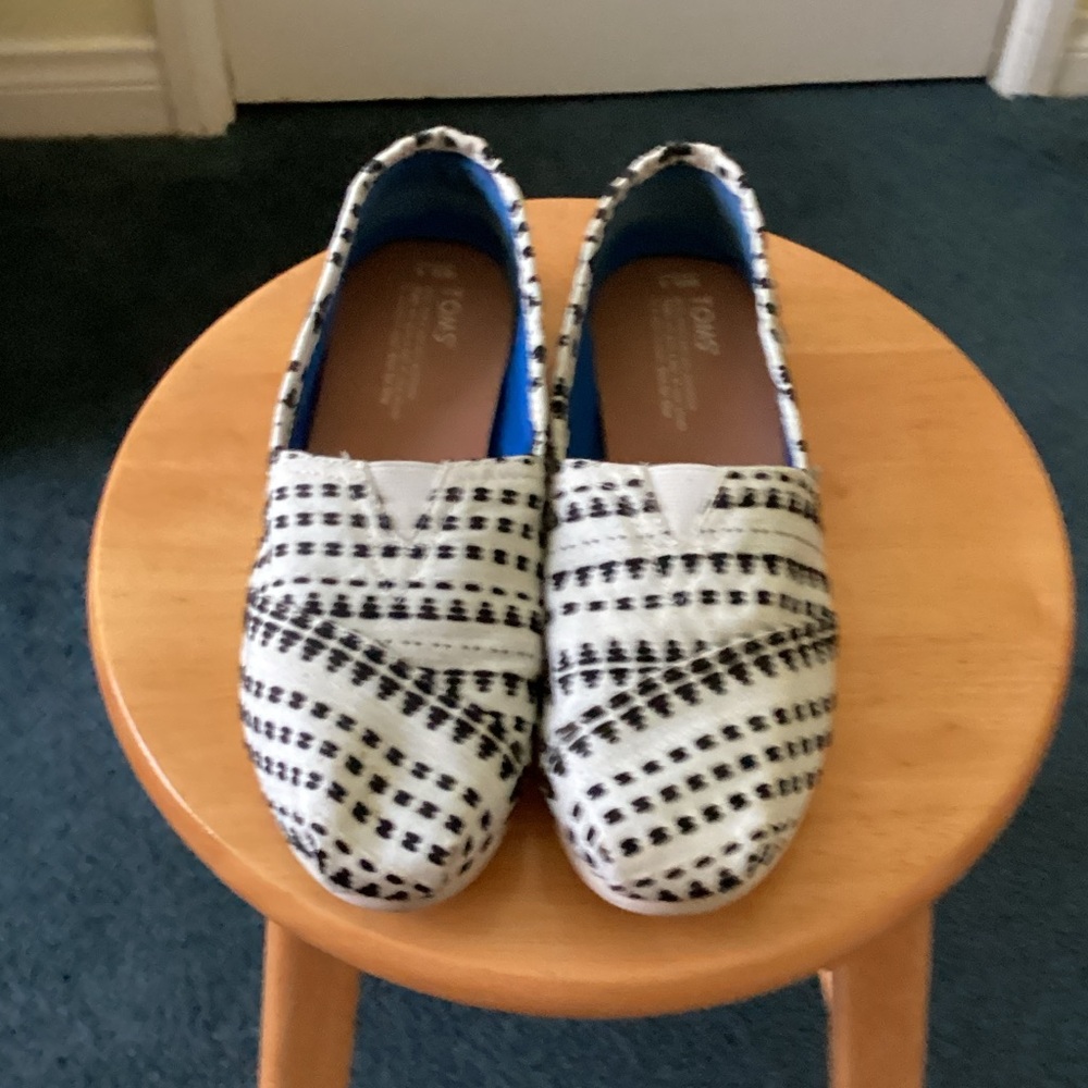 Toms Slip-On Shoes in Black and White Pattern